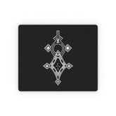 Rectangular mouse pad with black surface and white geometric design, non-slip rubber backing and durable cloth top.