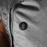 Round Pins with steel inner shell and magnetic backing on fabric, glossy scratch-resistant finish