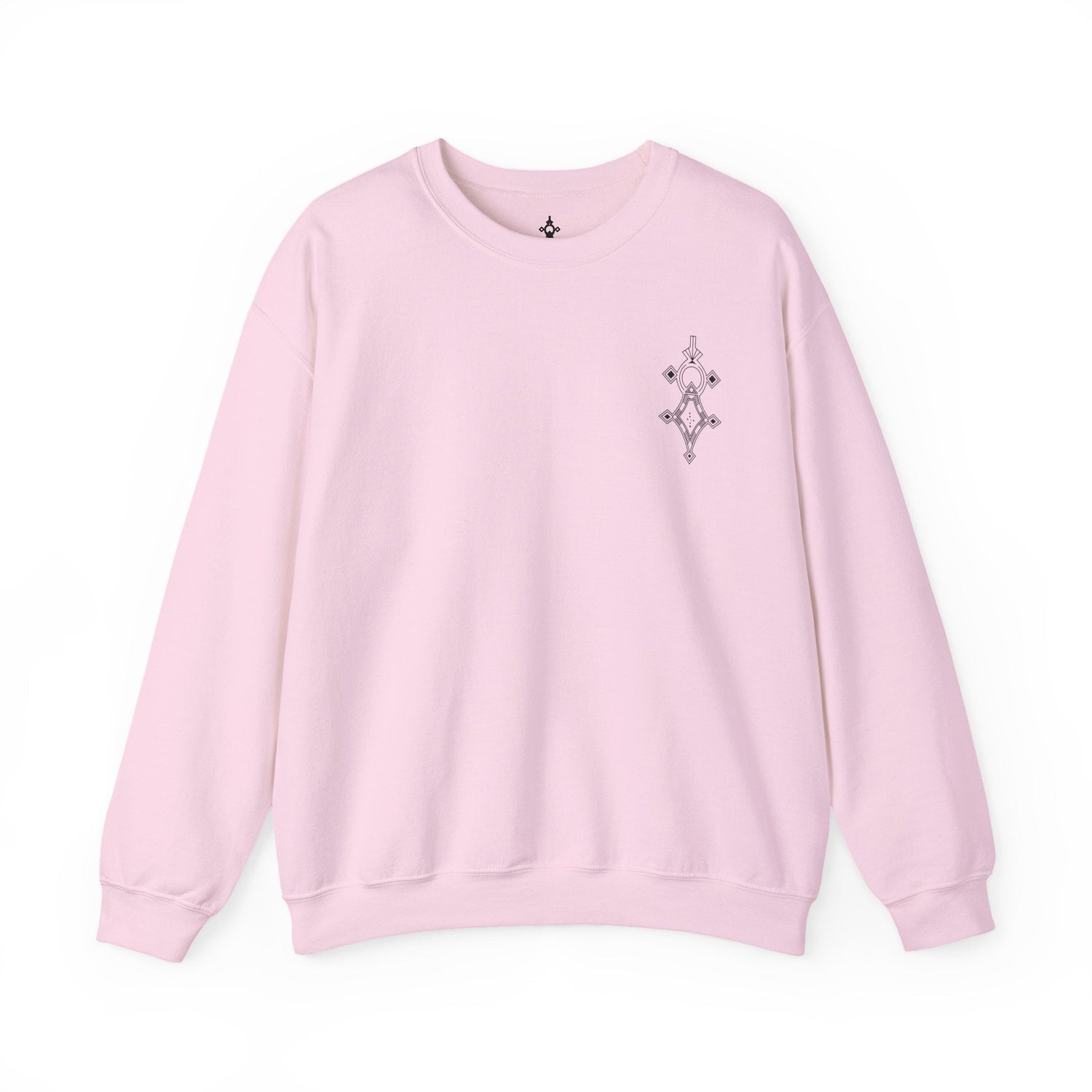 Women Heavy Blend™ Crewneck Sweatshirt in light pink with soft cotton-polyester blend and ribbed collar, featuring small chest embroidery.