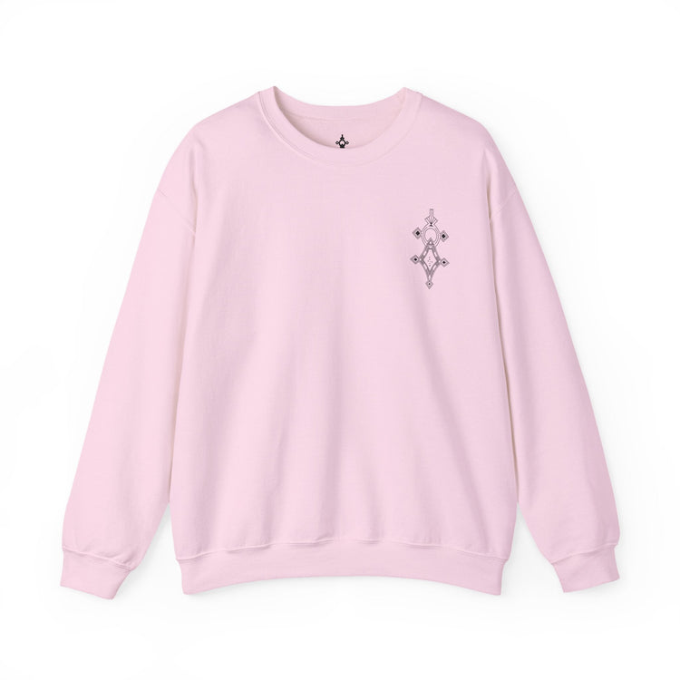 Women Heavy Blend™ Crewneck Sweatshirt in light pink with soft cotton-polyester blend and ribbed collar, featuring small chest embroidery.