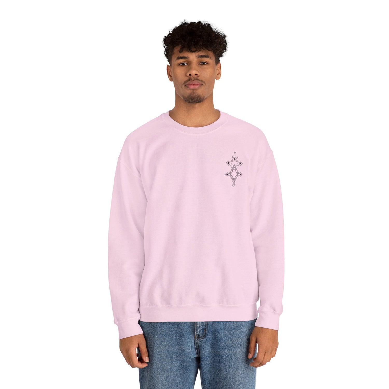 Men wearing light pink Heavy Blend™ Crewneck Sweatshirt with small chest embroidery and blue jeans