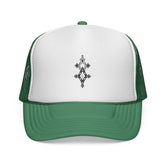 Green and white trucker cap with mesh back and adjustable snap closure, featuring stitched visor and simple logo design
