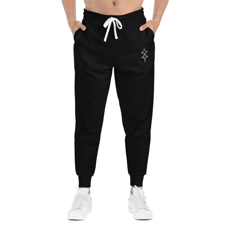 Men athletic joggers in black with white drawstring and cuffed ankles, designed for comfort and workouts