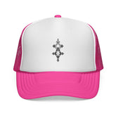 Pink and white trucker cap with adjustable snap closure and embroidered front design