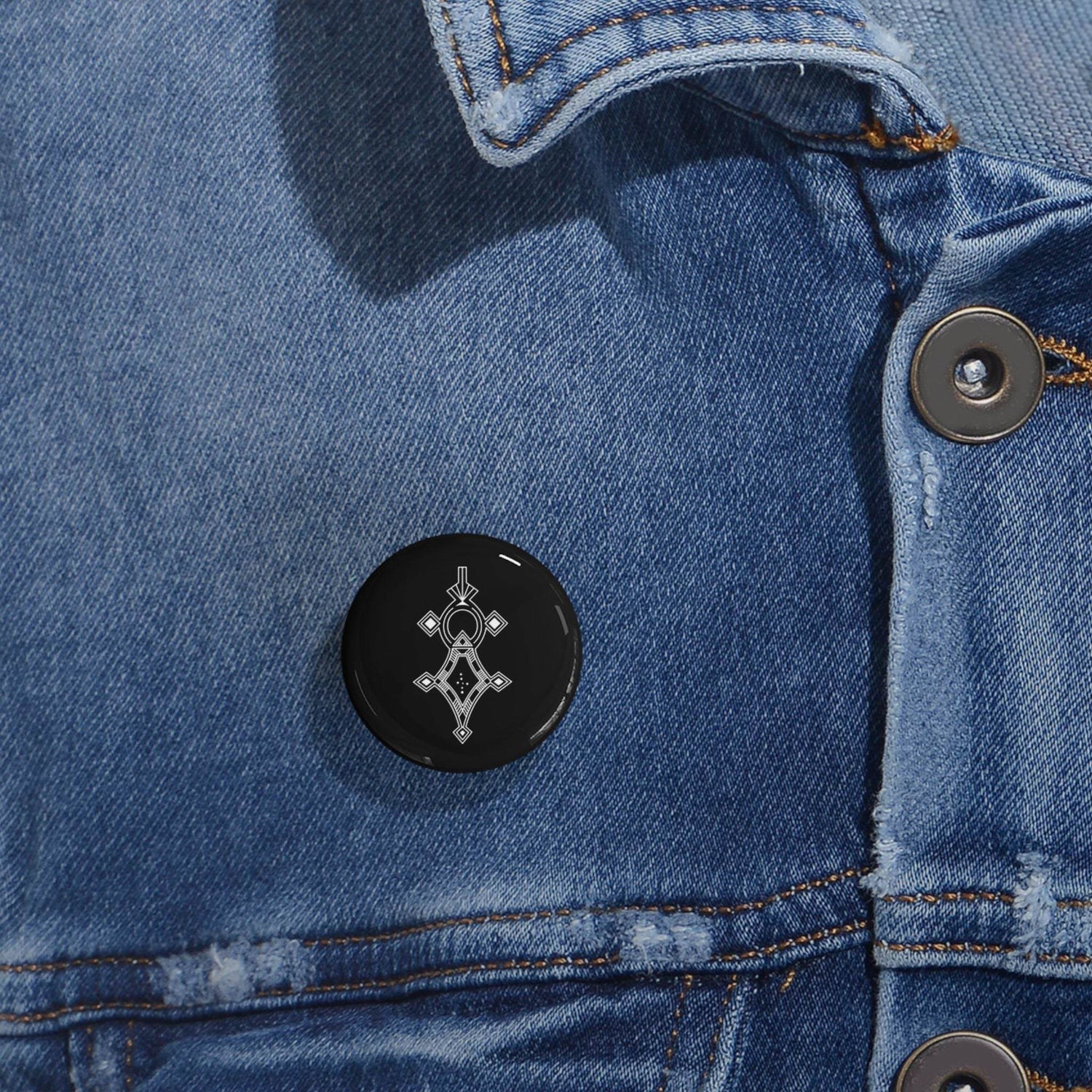 Round Pins black magnetic pin with geometric design on denim jacket with scratch-resistant glossy finish