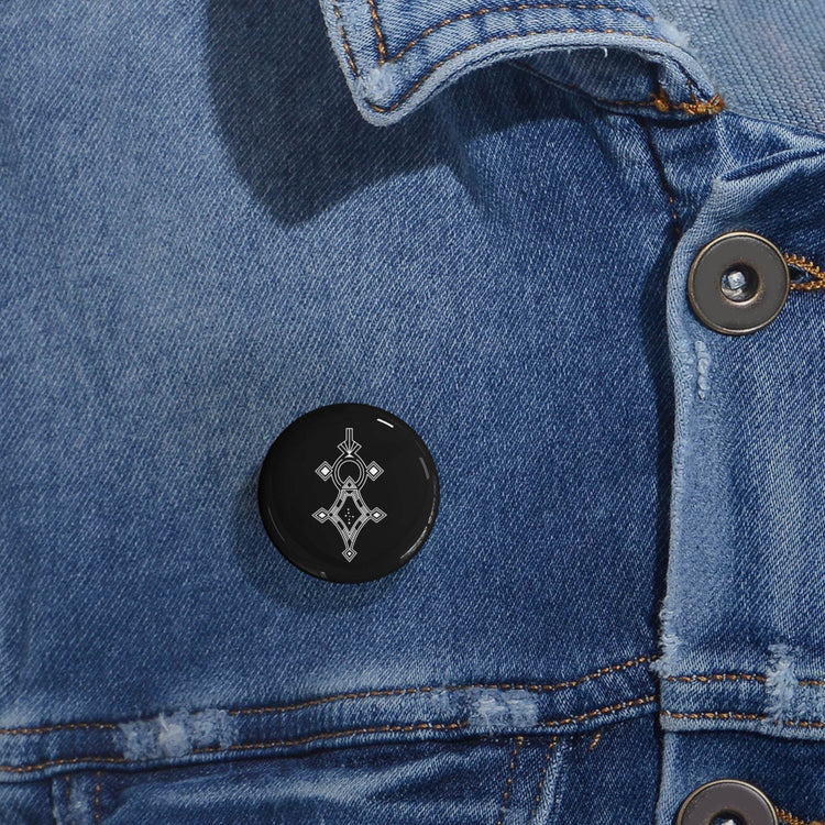 Round pins with steel inner shell, glossy UV cover, and magnetic backing on denim jacket