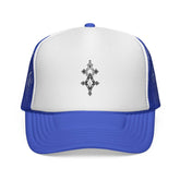 Blue and white trucker cap with black geometric design and mesh back