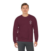 Man wearing maroon Heavy Blend™ Crewneck Sweatshirt with embroidery on chest