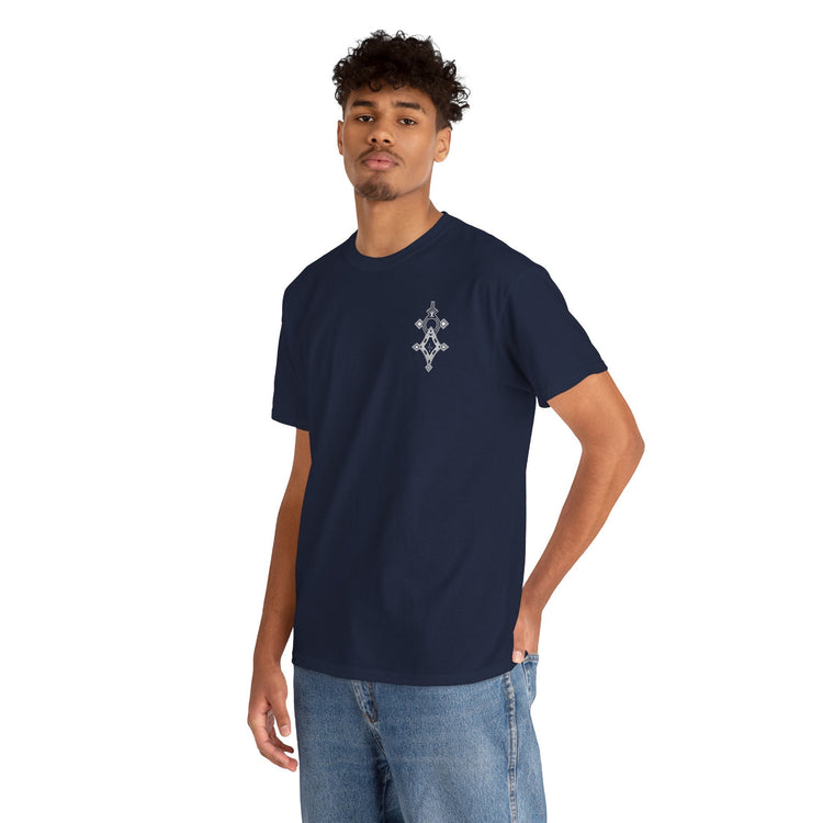 man wearing navy blue heavy cotton tee with small chest design and blue jeans