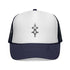 Navy blue and white trucker cap with adjustable snapback and geometric front design