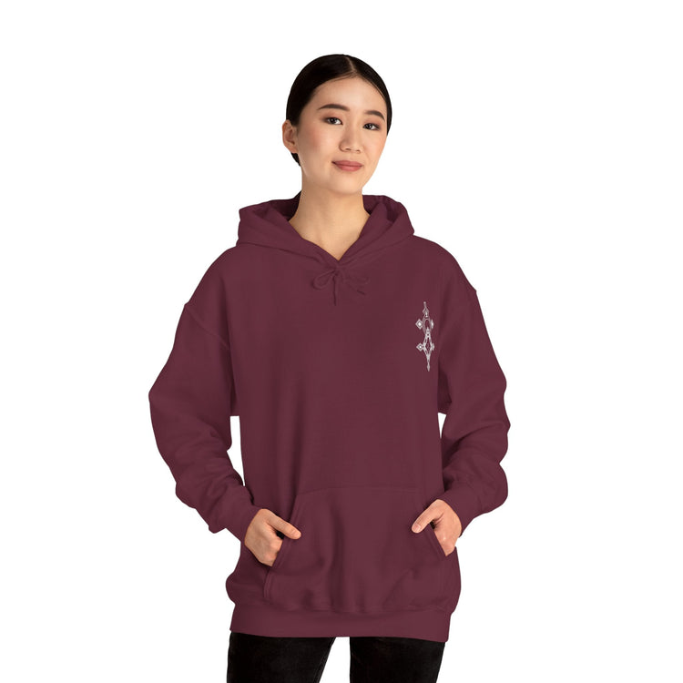 woman wearing maroon Heavy Blend™ Hooded Sweatshirt with front pocket and small chest embroidery