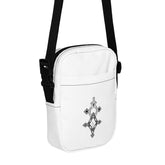 White utility crossbody bag with black adjustable strap and front geometric design, water-resistant and durable with multiple pockets
