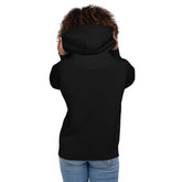 Back view of woman wearing black soft cotton blend hoodie with pouch pocket and hood