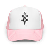 Pink and white foam trucker hat with black geometric design and mesh back