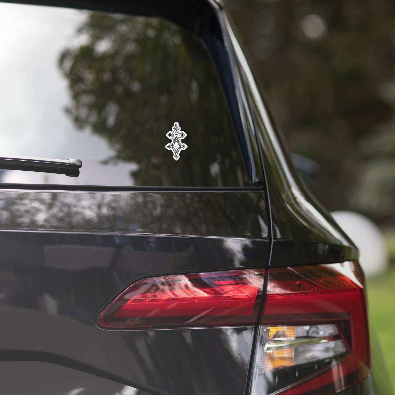 Bubble-free stickers on a car window with durable, high opacity vinyl for easy, bubble-free application