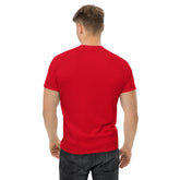 Man wearing red classic tee from the back, paired with black jeans