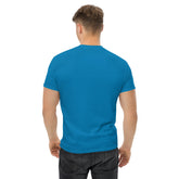 Man wearing a blue classic tee with a structured fit, viewed from the back