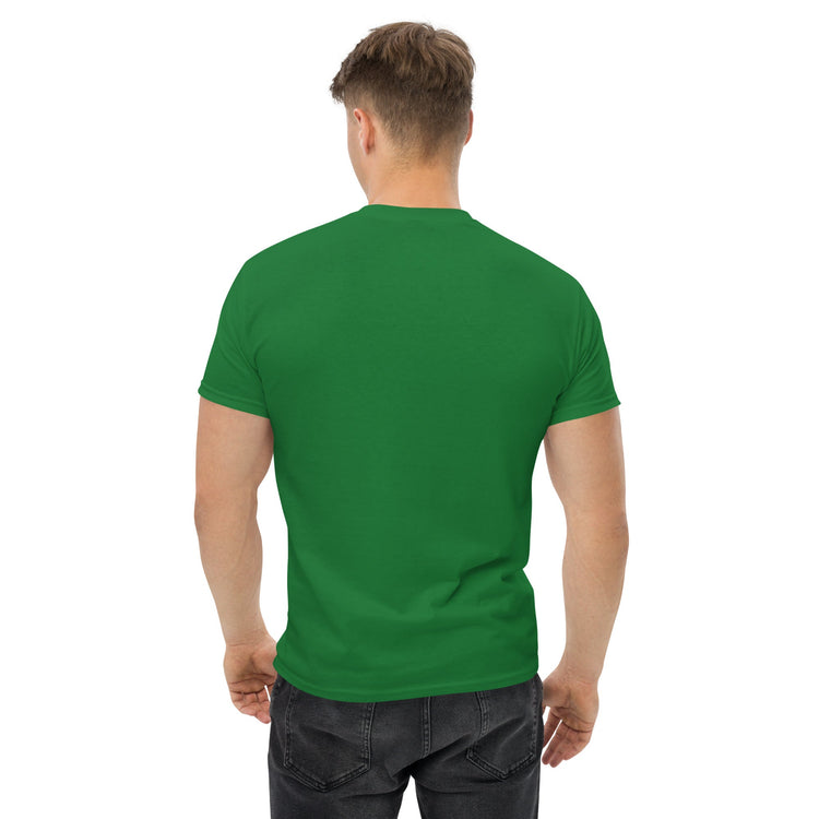Back view of man wearing green classic tee t-shirt with short sleeves and black jeans on white background