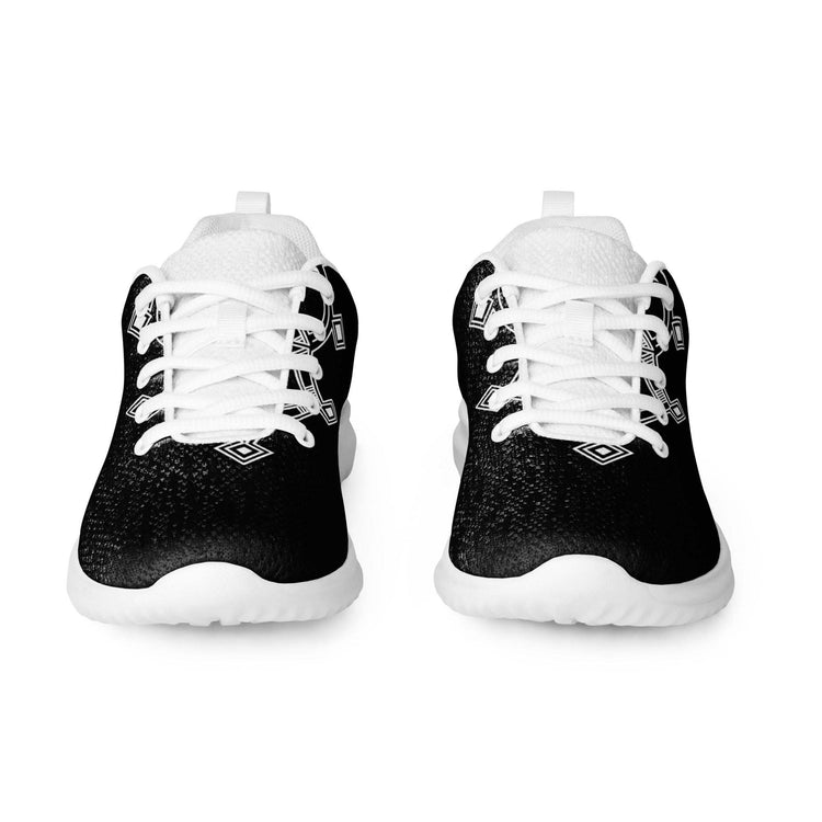 Pair of black and white women’s athletic shoes with breathable flyknit upper and white rubber outsole.