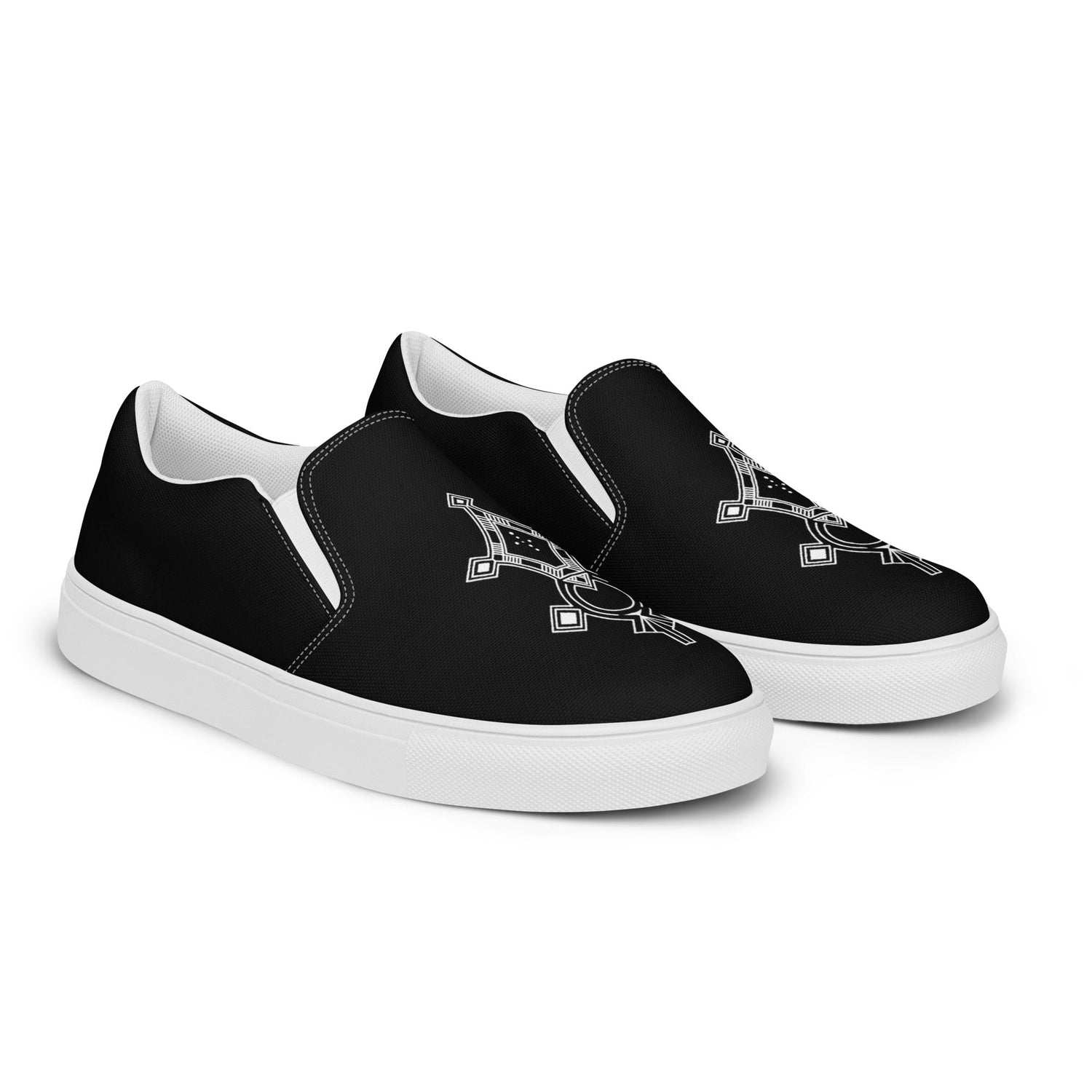 Black women’s slip-on canvas shoes with white rubber soles and geometric design on top
