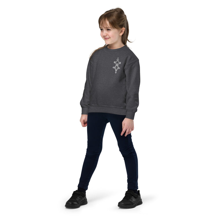 Youth crewneck sweatshirt in dark gray fleece worn by child with embroidered design on chest