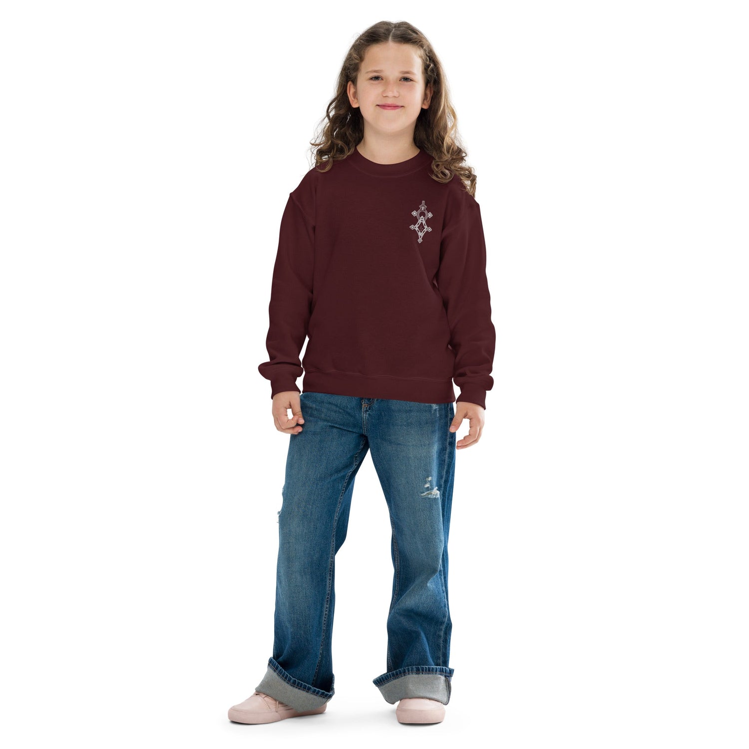 Youth crewneck sweatshirt in burgundy worn by child with jeans and sneakers