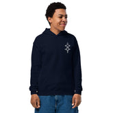 Youth heavy blend hoodie in navy blue with front pouch pocket and no drawcords, worn by a child.