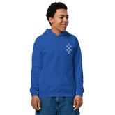 youth heavy blend hoodie in blue with front pouch pocket and double-lined hood worn by smiling child