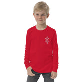 Youth long sleeve tee in red with ribbed cuffs and classic crew neck, worn by a boy