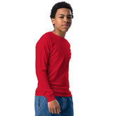 Youth long sleeve tee in red made of soft Airlume combed cotton with ribbed cuffs and classic crew neck.