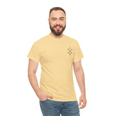 man wearing beige heavy cotton tee with short sleeves and printed design standing smiling