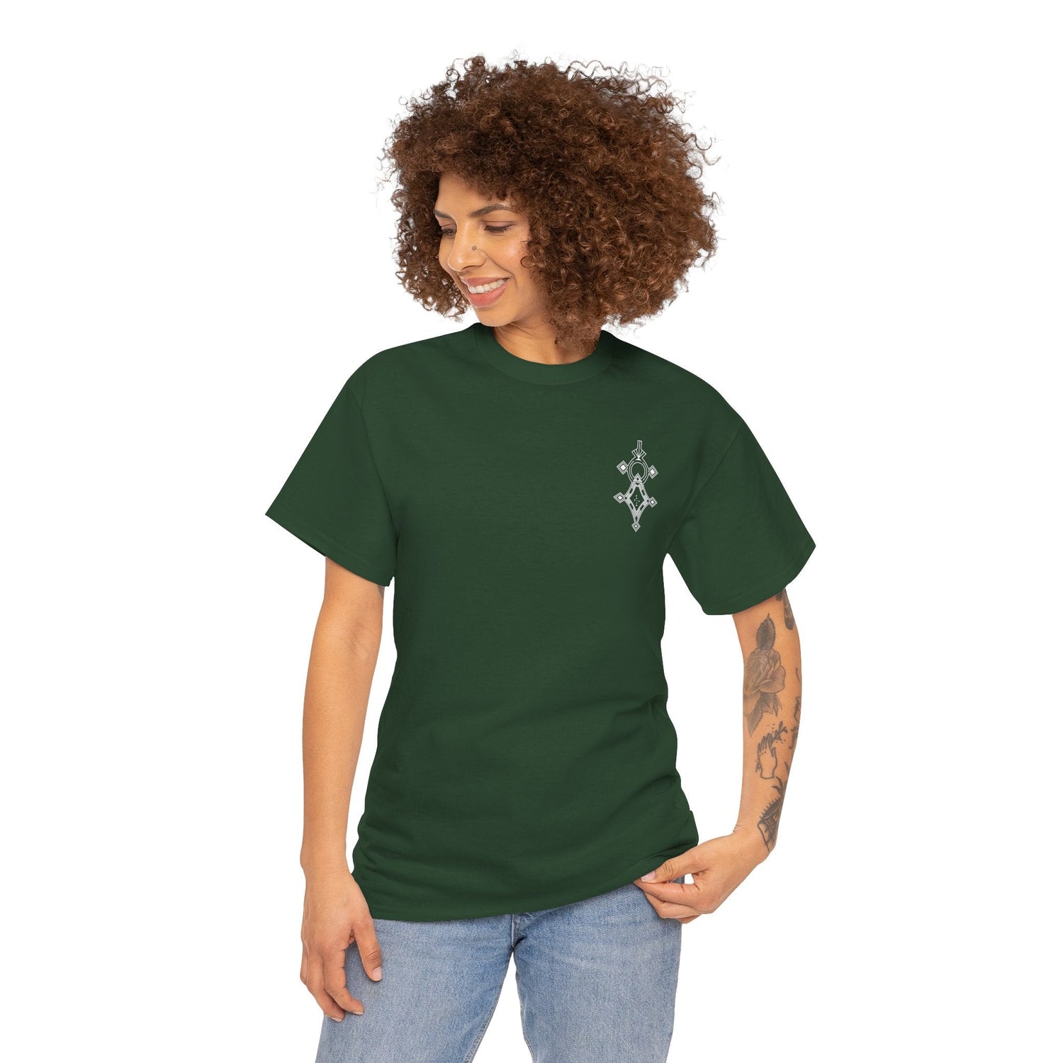 woman wearing green women heavy cotton tee with small white design on chest and light blue jeans
