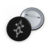 Black round pins with white geometric design, steel inner shell, magnetic metal backing, and scratch-resistant glossy finish