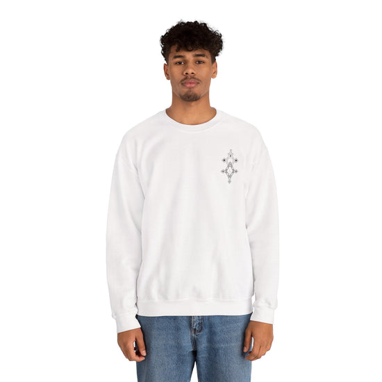 Men wearing white Heavy Blend™ Crewneck Sweatshirt with small chest embroidery and blue jeans on white background