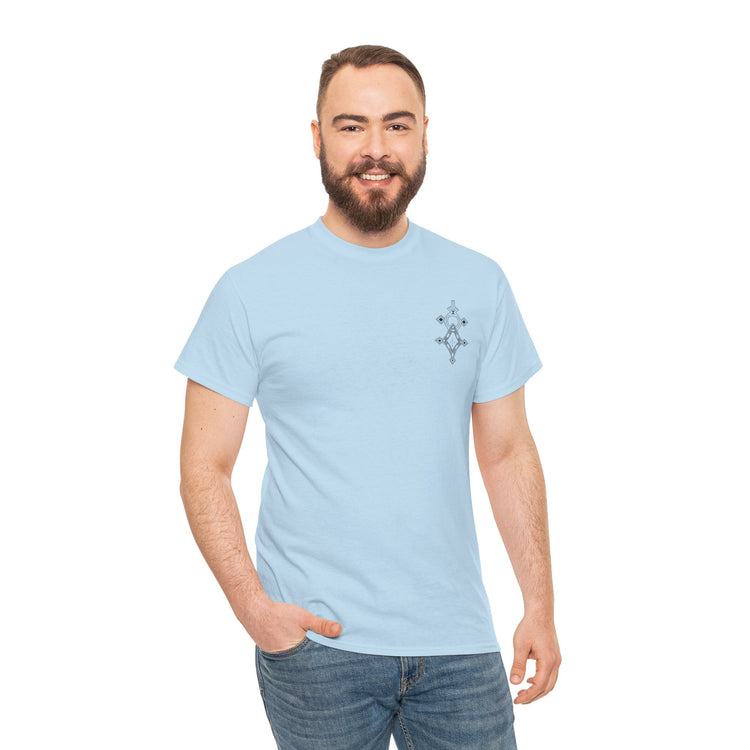 man wearing light blue heavy cotton tee with small design on chest and jeans smiling