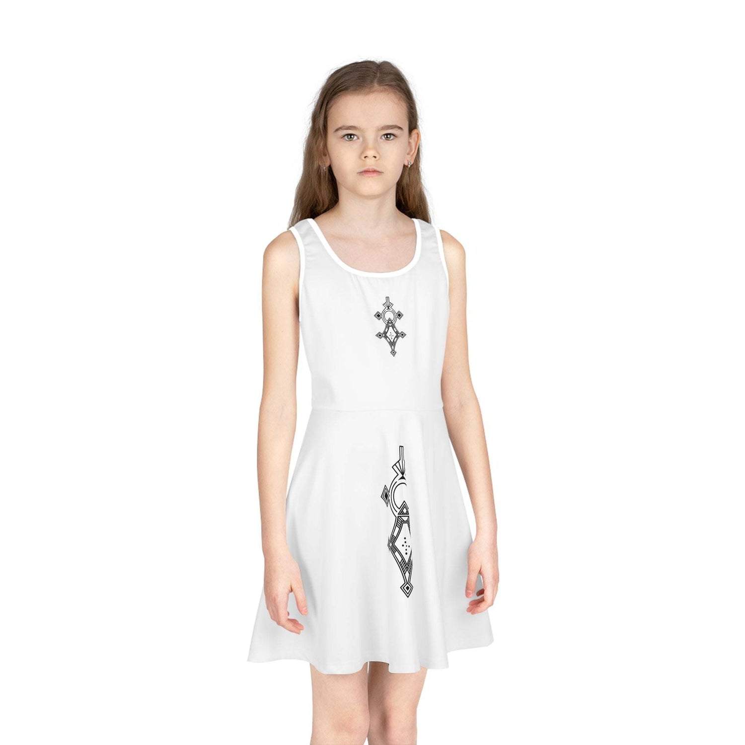 Girl wearing a white sleeveless sundress with black geometric designs, mid-length A-line cut, round neckline