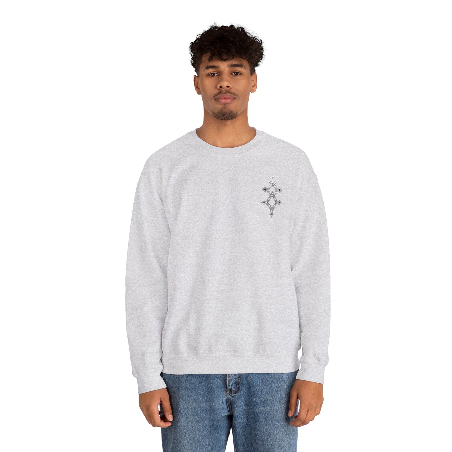 Men wearing light grey Heavy Blend™ Crewneck Sweatshirt with subtle chest design and blue jeans