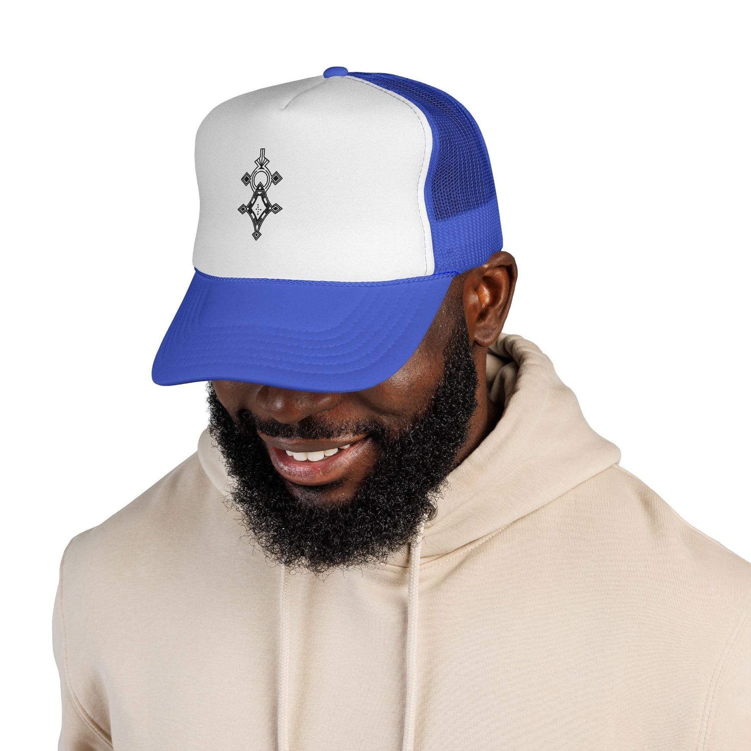 Blue and white trucker cap with adjustable snap closure and six-row visor stitching worn by smiling man