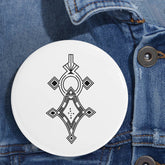 Round pin with black geometric design on white background, pinned to denim jacket, durable steel shell and scratch-resistant glossy finish