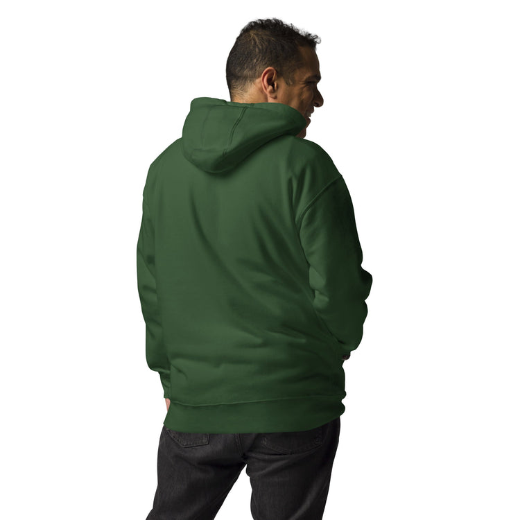 Back view of man wearing green men hoodie with hood up and hands in pockets