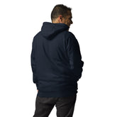 Back view of man wearing navy blue men hoodie with hood up and front pouch pockets in casual streetwear style