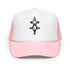Pink and white foam trucker hat with black geometric design and mesh back