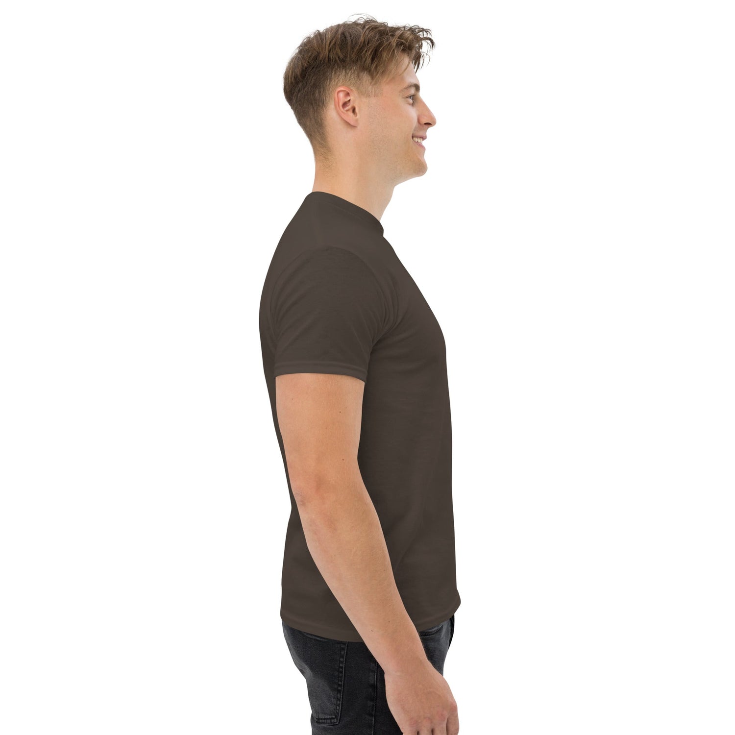 Side view of man wearing black classic tee for structured and trendy streetwear look