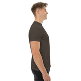 Side view of man wearing black classic tee for structured and trendy streetwear look