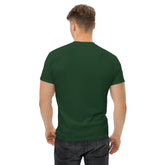 Back view of a man wearing a dark green classic tee cotton shirt