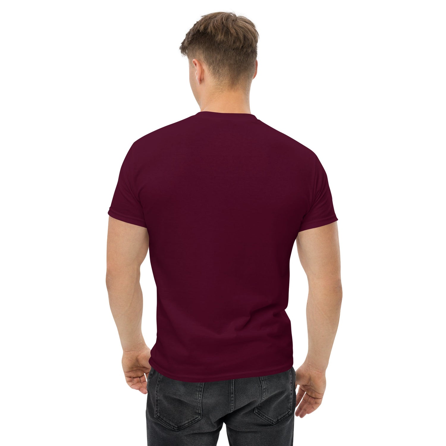 Back view of man wearing maroon classic tee shirt with short sleeves and black jeans