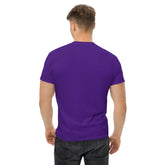 Man wearing a purple men classic tee made of 100% cotton from the back