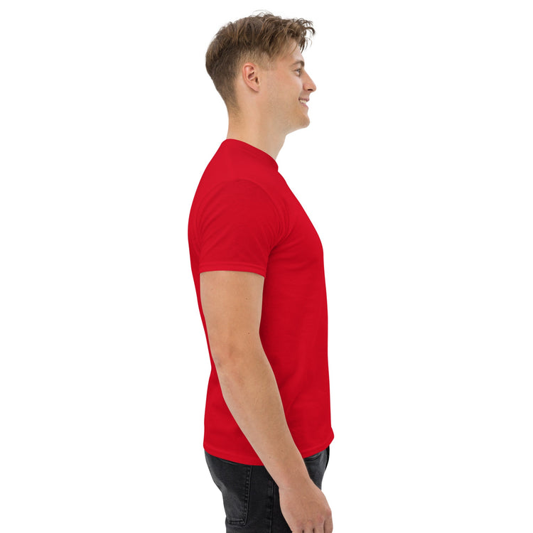 man wearing red classic tee side view simple background