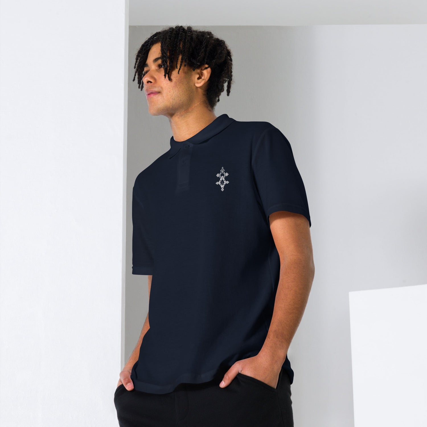 Men polo shirt in navy cotton pique fabric with classic collar and short sleeves worn by male model