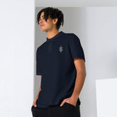 Men polo shirt in navy cotton pique fabric with classic collar and short sleeves worn by male model